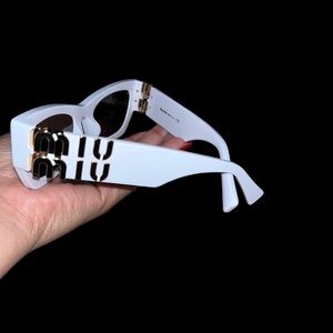 White Miu Miu Glimpse sunglasses